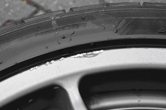 Subaru Impreza wheel showing flaking laquer